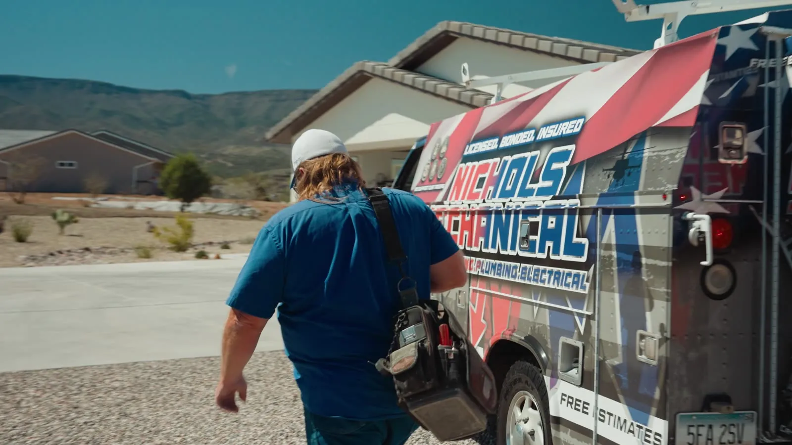 Nichols technician walking to his service van