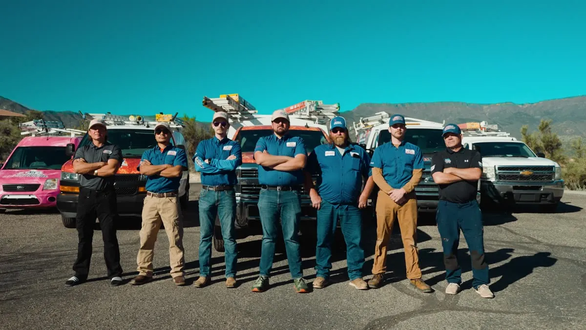 The Nichols team lined up in front of their service trucks